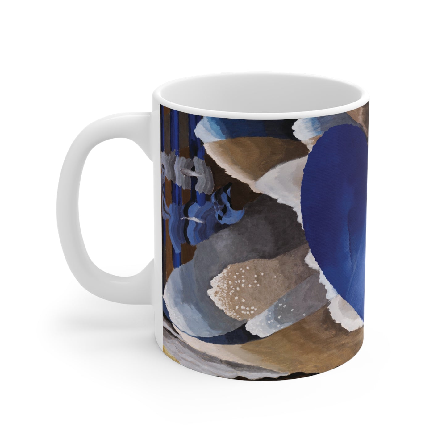 Mug with abstract design of blue, gray, and brown shapes with blue heart