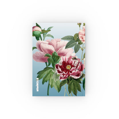 Notebook with floral design on a light blue background Back